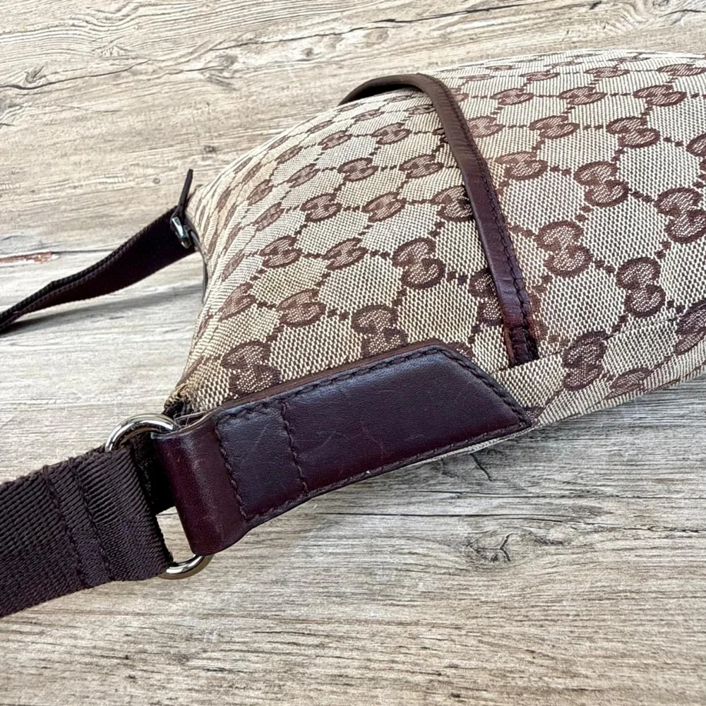 Gucci GG Monogram perforated leather messenger bag
